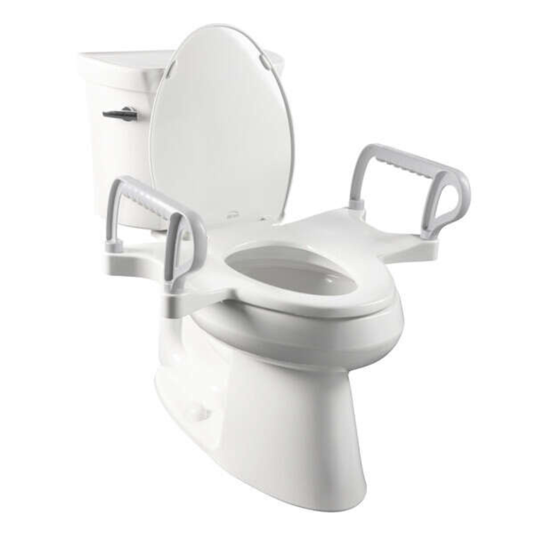 The Bemis Assist™ Standard Height Premium Toilet Seat with Support Arms offers a white raised seat with sturdy support arms, Stay·Tite Installation System for easier access, and firm rails for sitting and standing, while the toilet tank remains visible in the background.